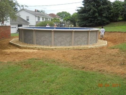 Optinal Pool Landscaping - 24 Round Pool with Wooden Outline Landscaping