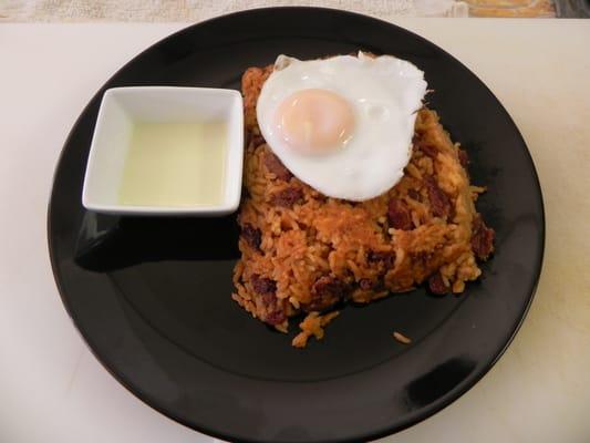 TACU-TACU. Peruvian style toasted and mixed rice & beans. Served with a spicy green sauce. Delicious!