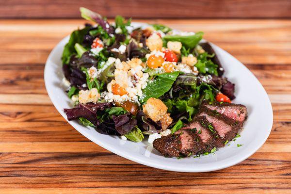 Preston's Steakhouse Nice Little Sirloin Salad pairs juicy sirloin with crisp greens and fresh toppings for a perfectly balanced mea