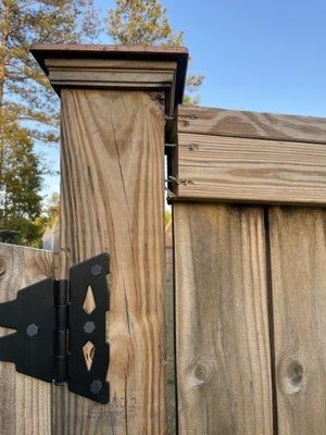 Fence post at gate