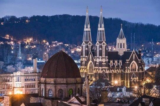 St. Mary's Help of Christian Church in the background and the former St. Francis De Sales church dome in the forefront