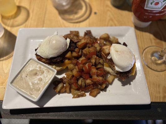 Down South Benedict (Poached eggs, Biscuit, country-fried chicken breast, cheddar cheese, sausage gravy)