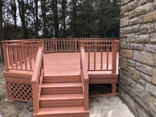 This Deck was Power washed sanded and Stained.