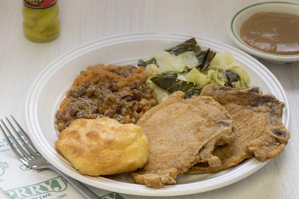 Fried Pork Chop Platter with cabbage and sweet potato soufflé