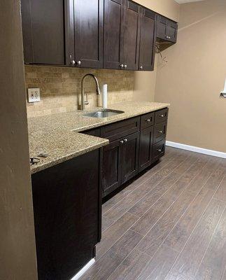 Full kitchen renovation new plumbing, electrical flooring countertop cabinets moldings plaster paint