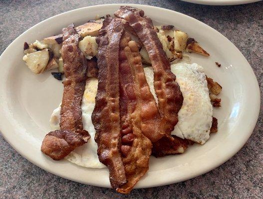 2 Eggs over medium, Bacon well done, Hash Browns & Corned Beef Hash