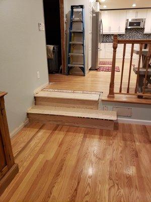 Newly constructed stairs by Dave that are now even and structurally sound (yes, new flooring will be applied!)