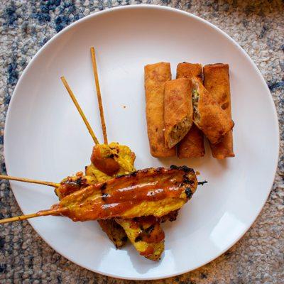 Chicken satay and crispy rolls