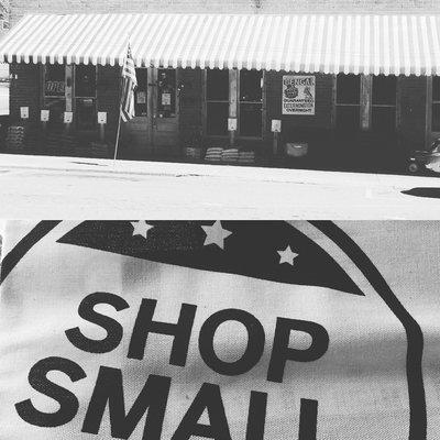 Black & white photo of store front