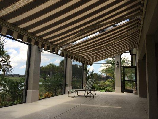 Enjoy the beautiful view by staying protected from those harmful UV Sun rays under a SunSetter Retractable Awning!