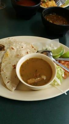 two tacos and charro beans