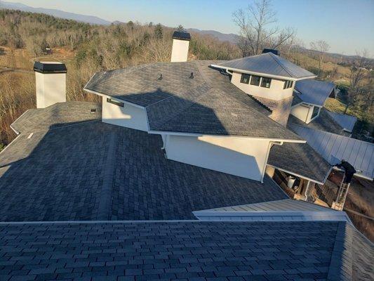 This is a view from the roof of a 1,200 foot gutter protection job we did near Asheville