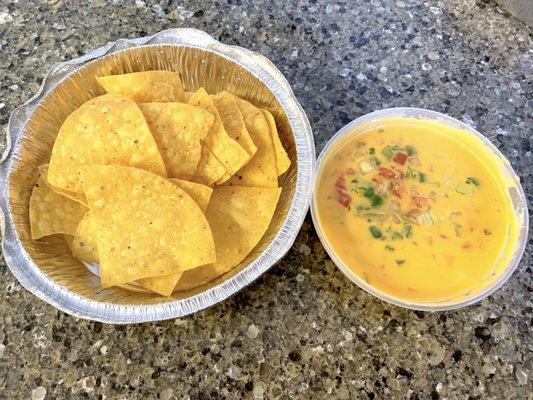 Queso Dip (chorizo on bottom) and Chips