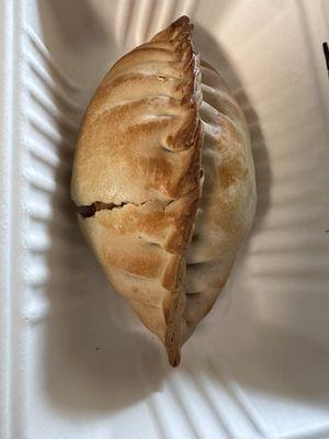 Empanada that has been torn open