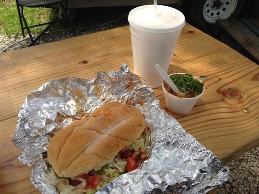 Torta pastor, frijoles charros, and massive horchata.  $8.