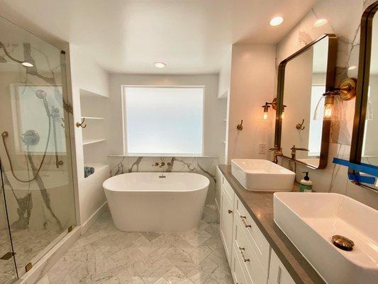 This beautful master bathroom remodel, accented with a Vinyl Picture window (Lowe over  Privacy Glass).