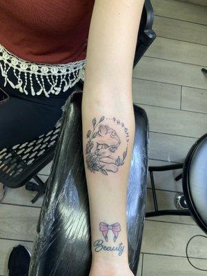 Lion and cub tattoo