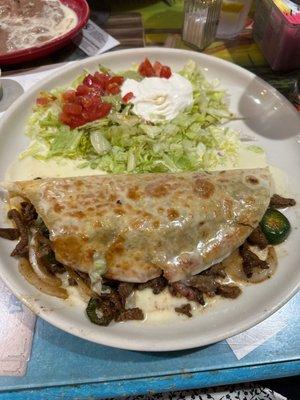 Grande quesadilla always delicious with added jalapeño you can't go wrong