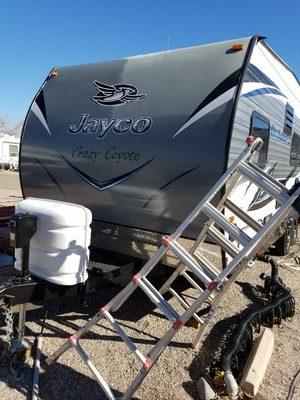 We waxed this trailer. The top right hand corner has not been waxed yet. See the difference.