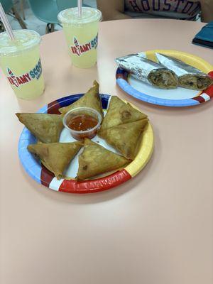 Beef Samosas and Limca and a chicken wrap