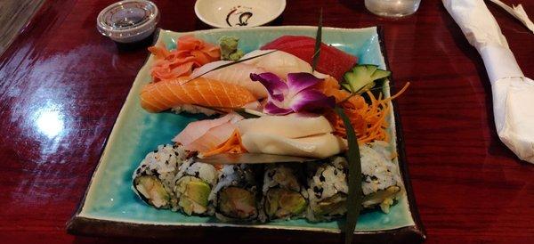 Sushi and sashimi combo. 4 Nigiri, 6 sashimi, 1 Cali roll