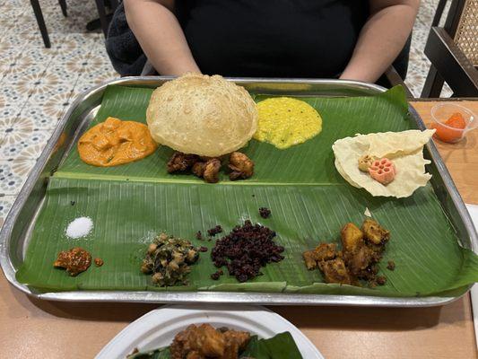 banana leaf weekend unlimited meal. just a fraction of what the staff brought out for him to try