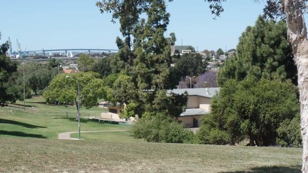 Great over view hill that sees from Coranado Bridge to Southcrest Rec. Bldg. to Baseball diamonds below. Near Alphs St. walk-in gate.