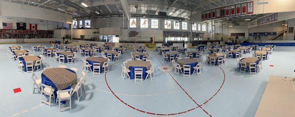 45 round tables and 360 premium white resin chairs for a nonprofit event