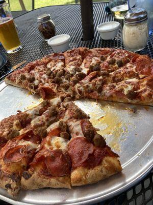 Large pepperoni and Italian sausage pizza