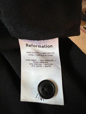 This is a tag showing the composition of the item that was returning with pilling all over.