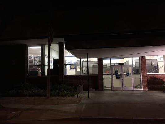 Yep, that's our Nation's flag up there at night in the dark, in front of a US Post Office. C'mon guys....