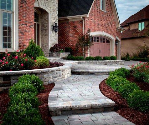 Renovated Front Yard: new steps, shrubs, greenery, walkway.