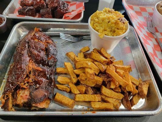 Ribs, fried red potatoes, corn pudding