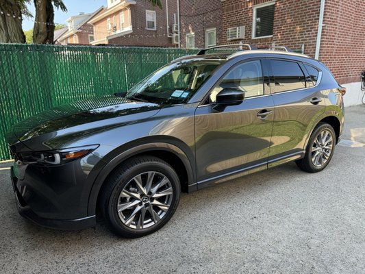 2024 CX-5 Metallic Grey with Parchment Leather interior.