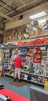 Matt retrieving my damper vents. I was referred here since local home improve stores did not carry special size for my parents old house.