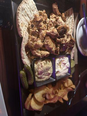 Chicken Platter, with garlic sauce, hummus, pita, pickles (if you are not familiar with these, they are fab), and their twisty fries.