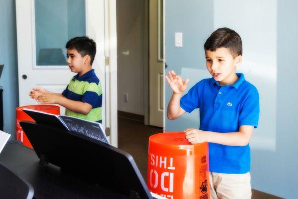 Bucket drumming is a FUN way to get students to isolate rhythm.