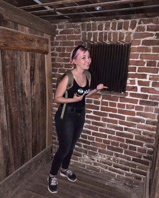 Concerned if I should smile during such a horrific place for a photo op. This was an original cell for the Shanghai'd victims.