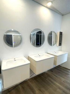 Wide selection of vanity cabinets, tops, and mirrors in stock