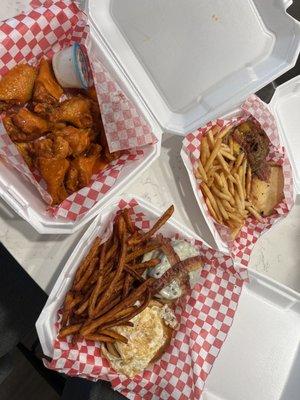 Traditional Buffalo wings, patches signature burger with sweet potato fries, and I forget what the other burger is.