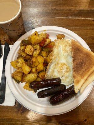 2 eggs over easy, potatoes, sausage, toast & coffee.