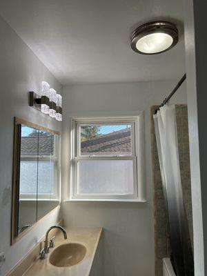 Installed exhaust fan with light and also Crystal vanity fixture