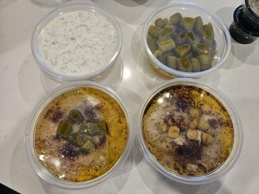 tzaziki hummus, baba ganoush, and pickles from Mixed Kebab Family Meal