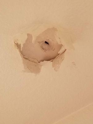 Leaks in ceiling caused by other apartments broken pipes, they never do anything to fix anything properly