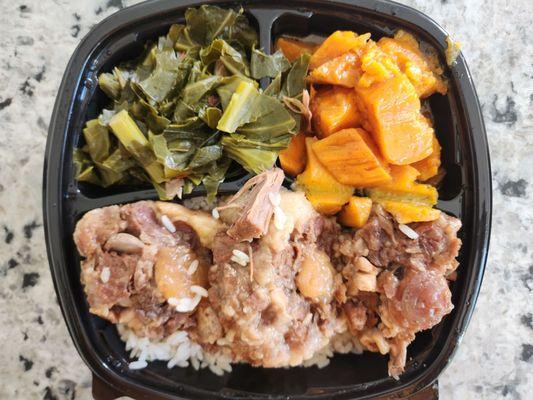 Oxtails over rice with sweet potatoes and collards