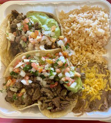 Carne asada tacos with beans a rice