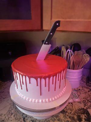 Tres Leches Cake. Two 12 inch rounds stacked on top of each other. We added the knife.