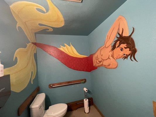 Ladies' restroom comes with a cheerful mer-man