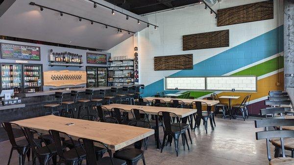 Scion Cider Bar bright & modern interior. Large tables for groups, games & community events.