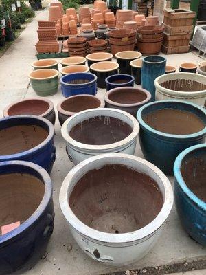 They have real terra-cotta pots in assorted sizes!!!